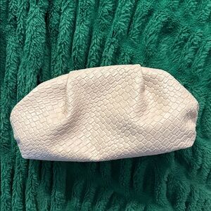 Cream textured clutch